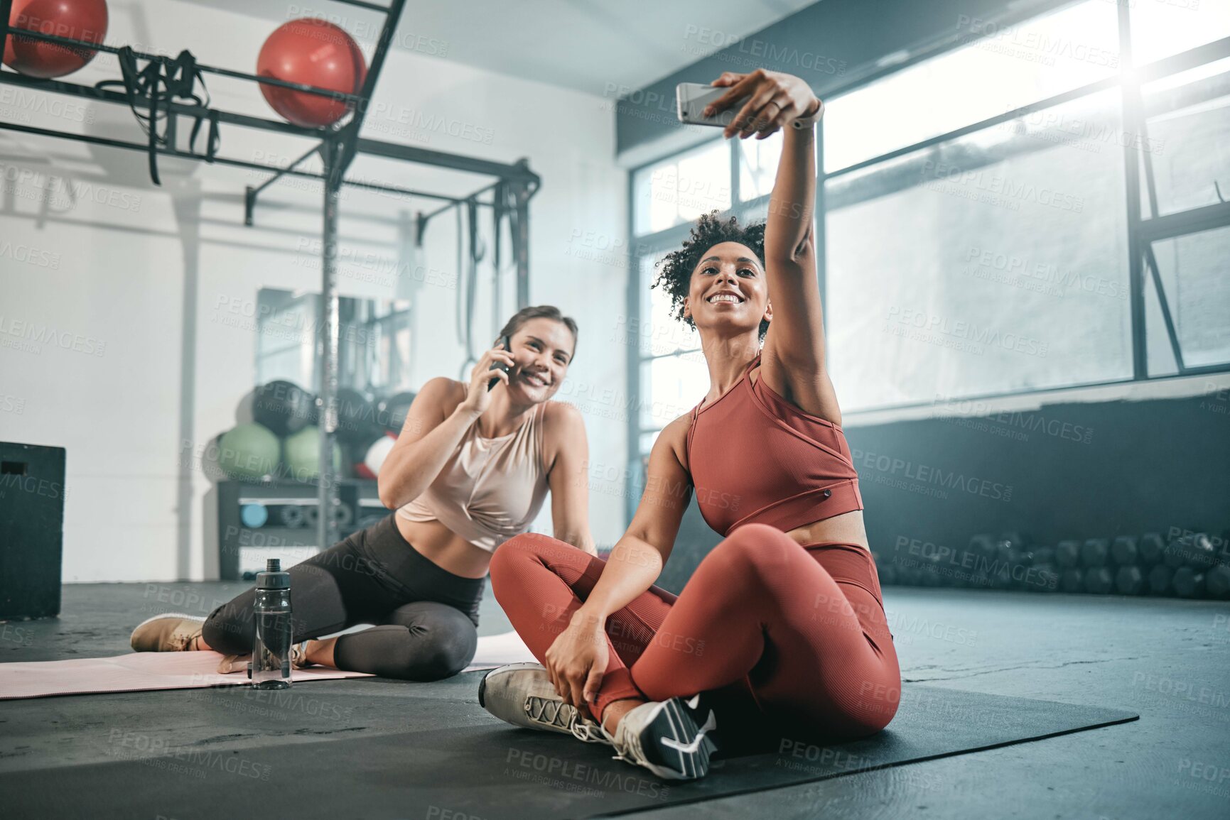 Buy stock photo Fitness, phone or friends take a selfie at gym for social media after workout exercises in health club. Relaxed girls, photo or happy sports women take pictures after exercising or training together