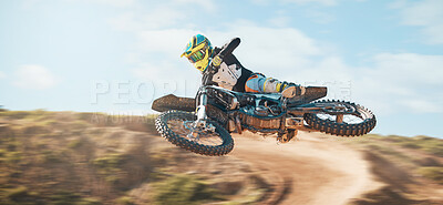 Buy stock photo Motorcycle, fearless man and motorcross jump in desert, blue sky and freedom. Driver, cycling and offroad freedom of sports competition, motorbike performance or adventure course for fast action show