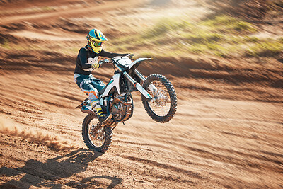 Buy stock photo Motorcycle, dirt track stunt and air jump in desert, sand trail and freedom. Driver, cycling and offroad freedom, sports competition and motorbike performance on adventure course for fast action show