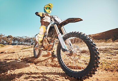 Buy stock photo Motorcross, motorcyclist and man in sports gear for challenge, offroad race and desert rally. Driver, bike and ready for dirt track competition, motorbike performance and action on adventure course 