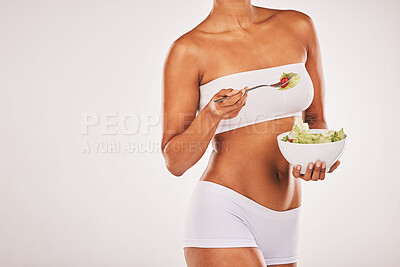 Buy stock photo Salad, beauty and body of woman isolated on a white background diet, lose weight and healthy food promotion. Green vegetables, fitness and model person in underwear for detox results in studio mockup