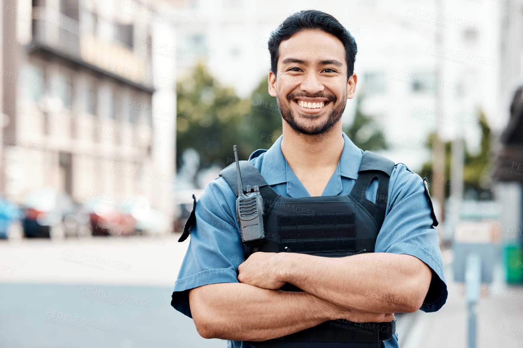 Buy stock photo Portrait, happy or policeman in city with arms crossed for law enforcement, surveillance or street safety. Confident cop, smile or proud Asian security guard on patrol in town for crime or justice 