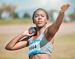 Shot put, athlete and woman in throw competition, championship or training for field event with metal or steel weight. Throwing, ball or African female outdoor for athletics sports