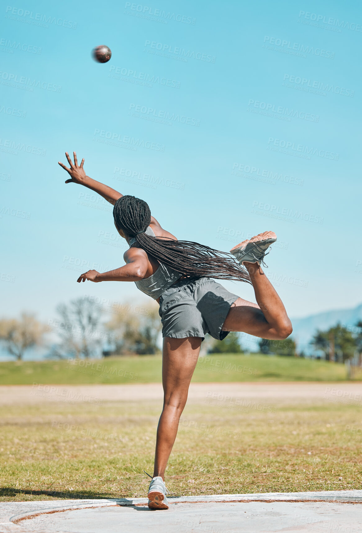 Buy stock photo Shot put, woman and athlete throw in competition, challenge or training for field event with metal or steel weight. Throwing, ball or female in athletics sports, games or outdoor tournament