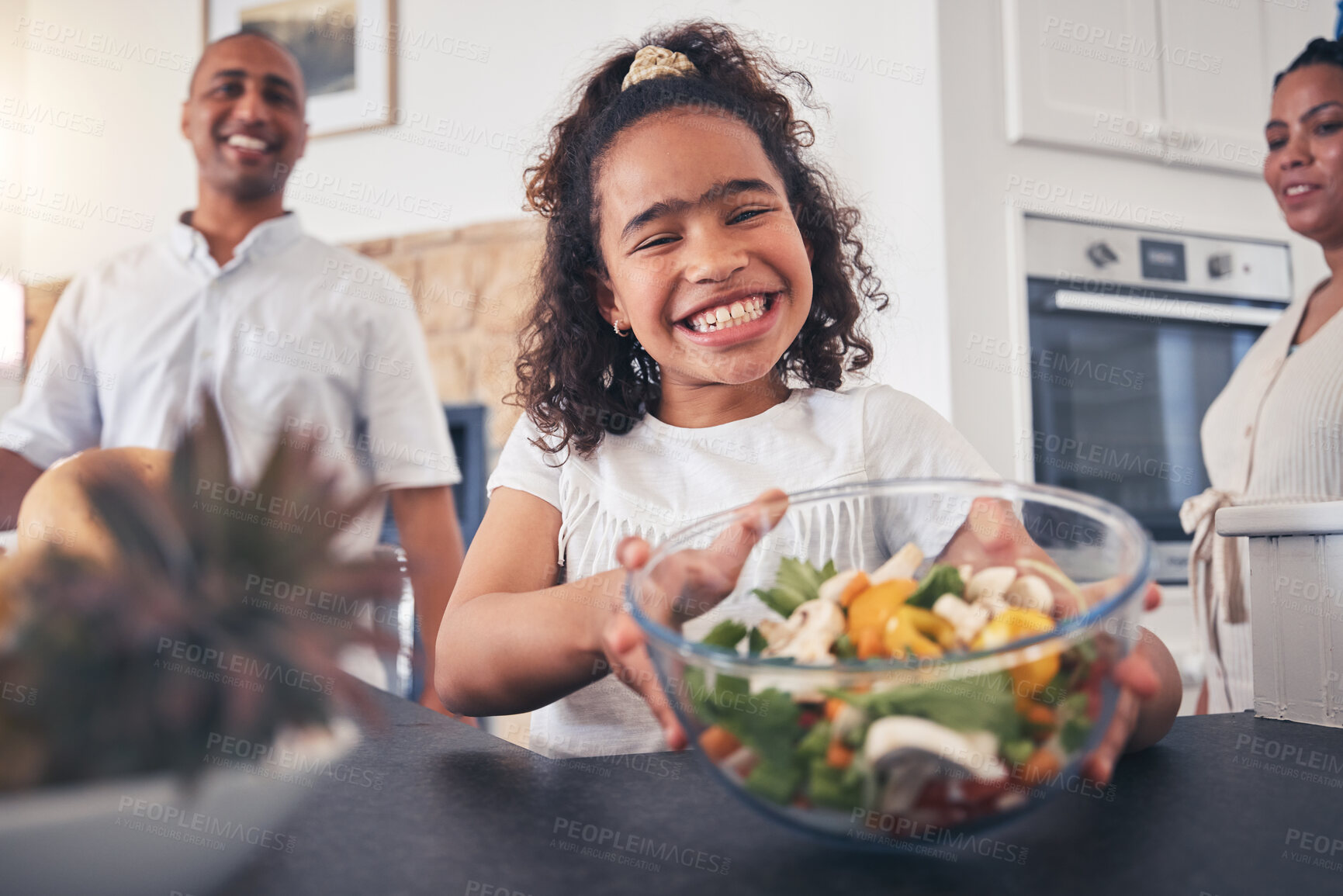 Buy stock photo Child, smile and dinner table with salad, healthy food and thanksgiving meal with family at home. Happy, young girl and giving at a holiday with portrait and parents at lunch with people together