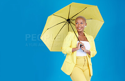 Buy stock photo Black woman, umbrella and face with smile in studio for life insurance and security isolated on blue background. Shield, happiness and person for fashion, style and confidence with mockup space