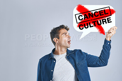 Buy stock photo Cancel culture, speech bubble and man with voice for support, censorship and opinion on grey background in studio. Poster, ban and social media influencer for freedom of vote, politics and propaganda