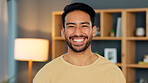 Face of a happy male interior designer. Portrait of a young confident entrepreneur or trendy real estate agent looking confident and smiling after styling a living room with a new modern design