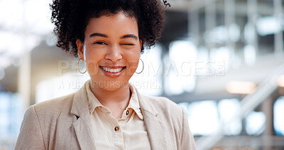 Buy stock photo Leadership, business and woman face wink in corporate workplace with goals, mission and vision on blurred background. Portrait, startup and entrepreneur with happy mindset, motivation and confidence.