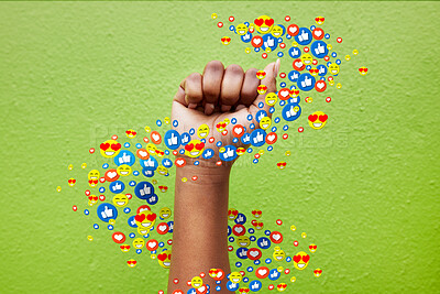 Buy stock photo Hand, social media and emoji with a person in protest on green background for politics, power or strength. Fist, like and reaction with an adult in studio for a digital app emoticon for communication