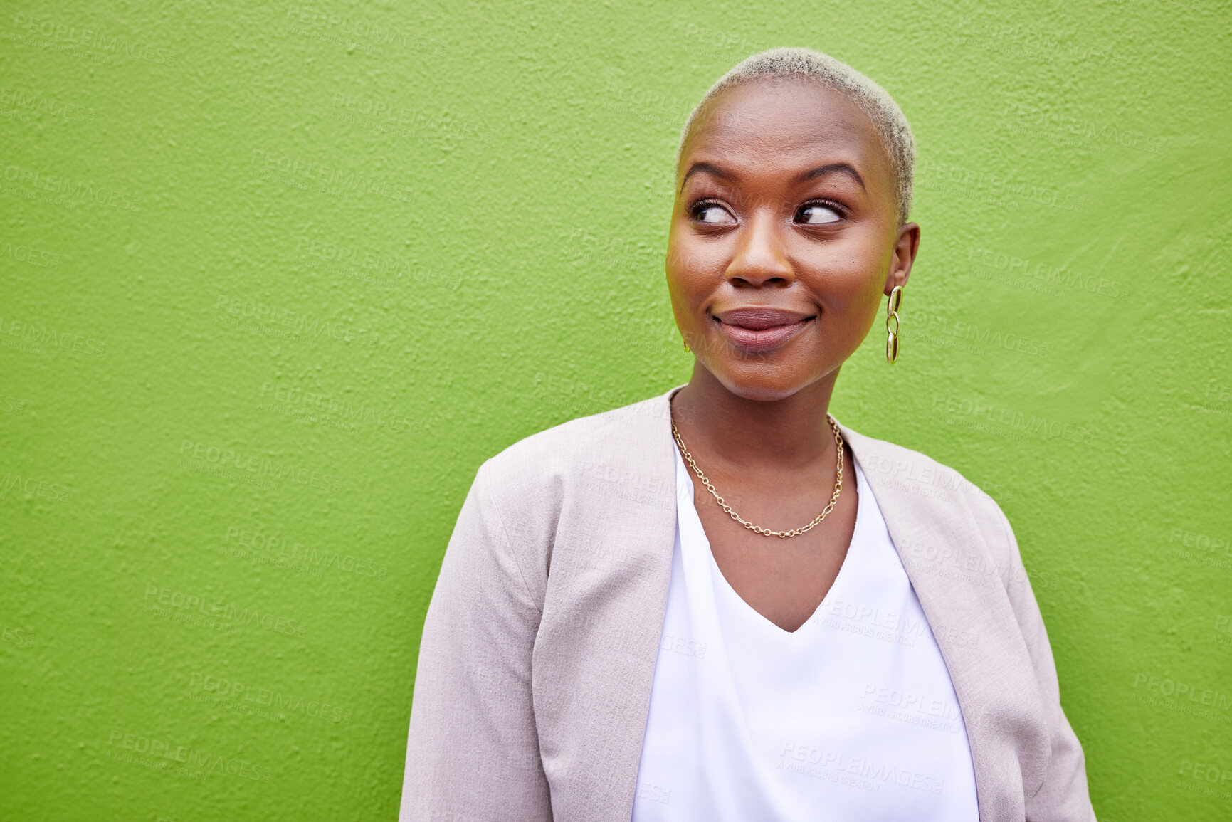 Buy stock photo Smile, thinking and black woman with mockup space for marketing, promotion or advertising on green background. Idea, happy and young african person with dreaming, memory or reflection expression