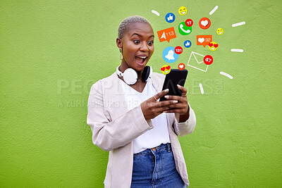 Buy stock photo Surprise, black woman and reading phone emojis, social media icons and wow facial expression for networking notification. App opinion, cellphone communication or shocked user on green background wall