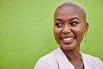 Smile, face and young black woman by a green wall with trendy, classy and elegant jewelry and outfit. Happy, excited and African female model with positive and confident attitude with fashion.