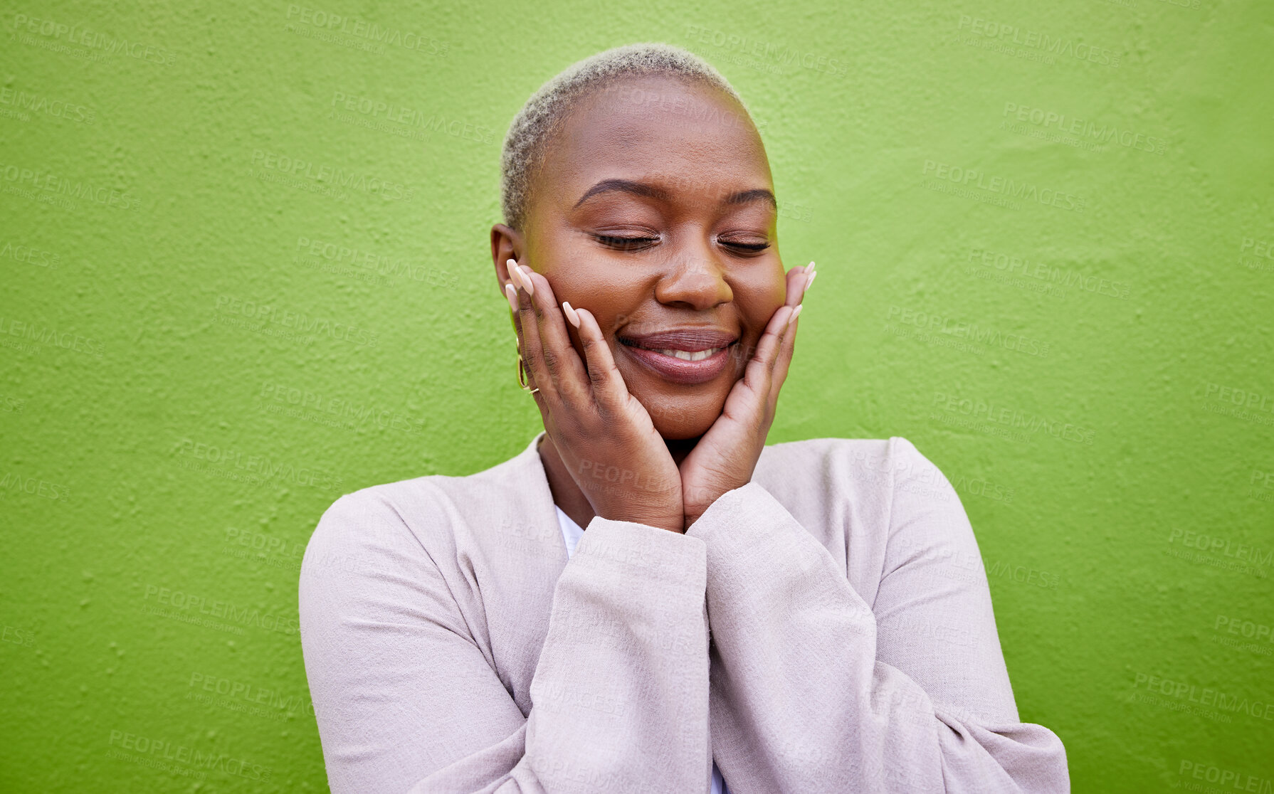 Buy stock photo Happy, black woman and self love or stylish on a green wall for fashion, thinking or trendy. Smile, young and a calm African girl or fun model with confidence, fashion or peace on a background