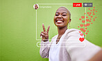 Portrait, social media and a peace sign with a black woman recording live content for like, emoji or interaction. Frame, smile and update with a happy young influencer in studio on a green background