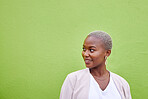 Smile, thinking and black woman by green wall with mockup space for marketing, promotion or advertising. Idea, happy and young African female model with dreaming, memory or reflection face expression