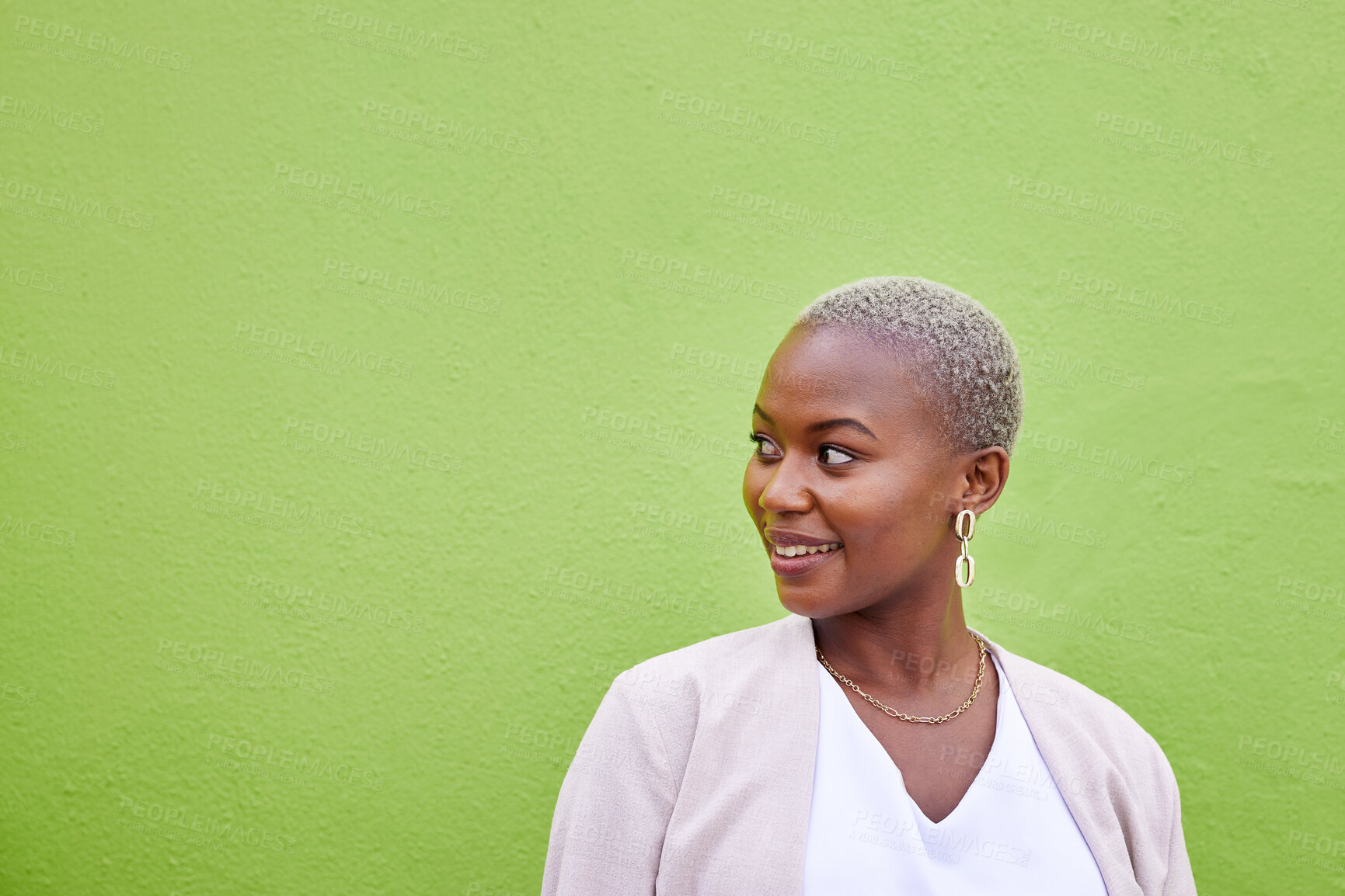 Buy stock photo Smile, thinking and black woman by green wall with mockup space for marketing, promotion or advertising. Idea, happy and young African female model with dreaming, memory or reflection face expression