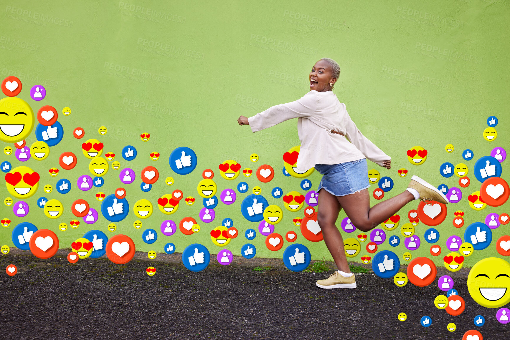 Buy stock photo Social media, emoji icon or influencer woman on city street for like or love reaction. Excited african person run on fan page, content creator app or communication notification overlay on green wall
