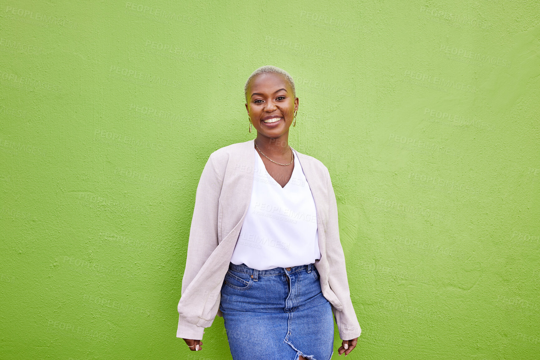 Buy stock photo Portrait, fashion and happy black woman on green wall background mockup space. Positive designer, smile and confident African person in style, casual clothes and trendy aesthetic in Nigeria outdoor