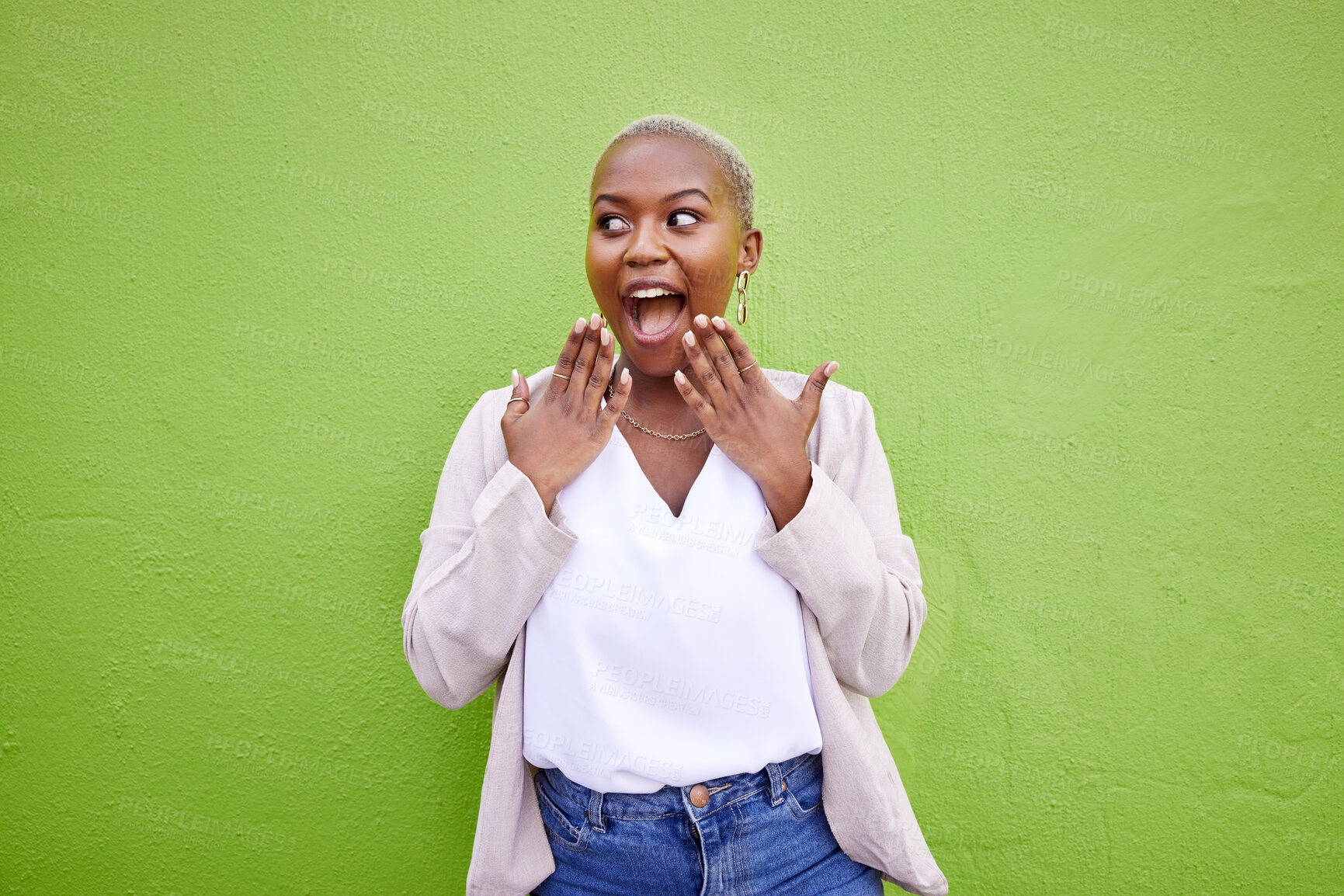 Buy stock photo Excited, thinking and black woman surprise by news, deal or discount offer isolated in a studio green background. Wow, gossip and young person with emoji reaction to announcement or promotion