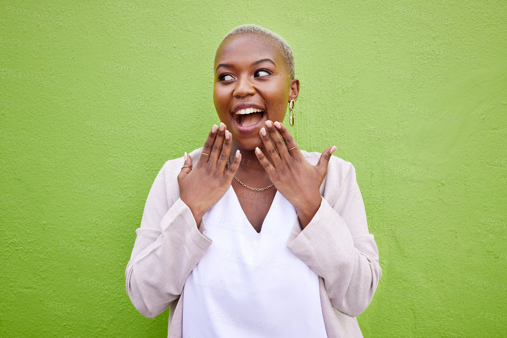 Buy stock photo Wow, thinking and black woman surprise by news, deal or discount offer isolated in a studio green background. Excited, gossip and young person with emoji reaction to announcement or promotion