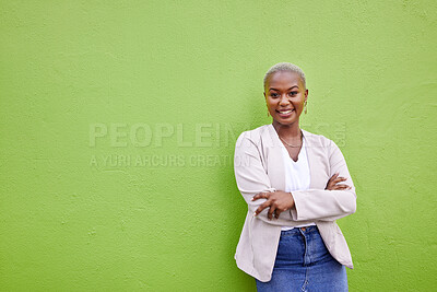 Buy stock photo Portrait, fashion and black woman smile with arms crossed on green wall background mockup space. Positive designer, happy and confident African person in style, casual clothes and trendy in Nigeria