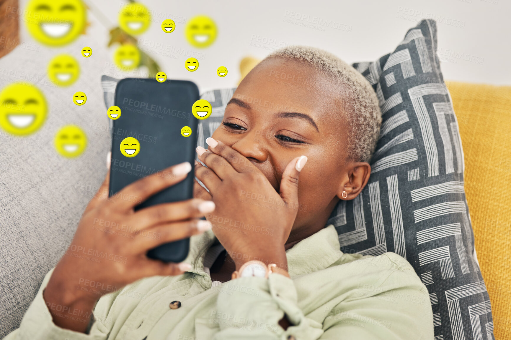 Buy stock photo Black woman on sofa with phone, laughing and emoji on social media, message or video online. Happy face, smile and internet, girl on couch with digital app on smartphone and funny viral meme in home.