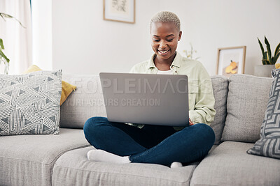 Buy stock photo Happy, relax and a black woman on the sofa with a laptop for a movie, streaming a show or chat. Smile, house and an African girl typing on a computer on a couch for an email, communication or a blog