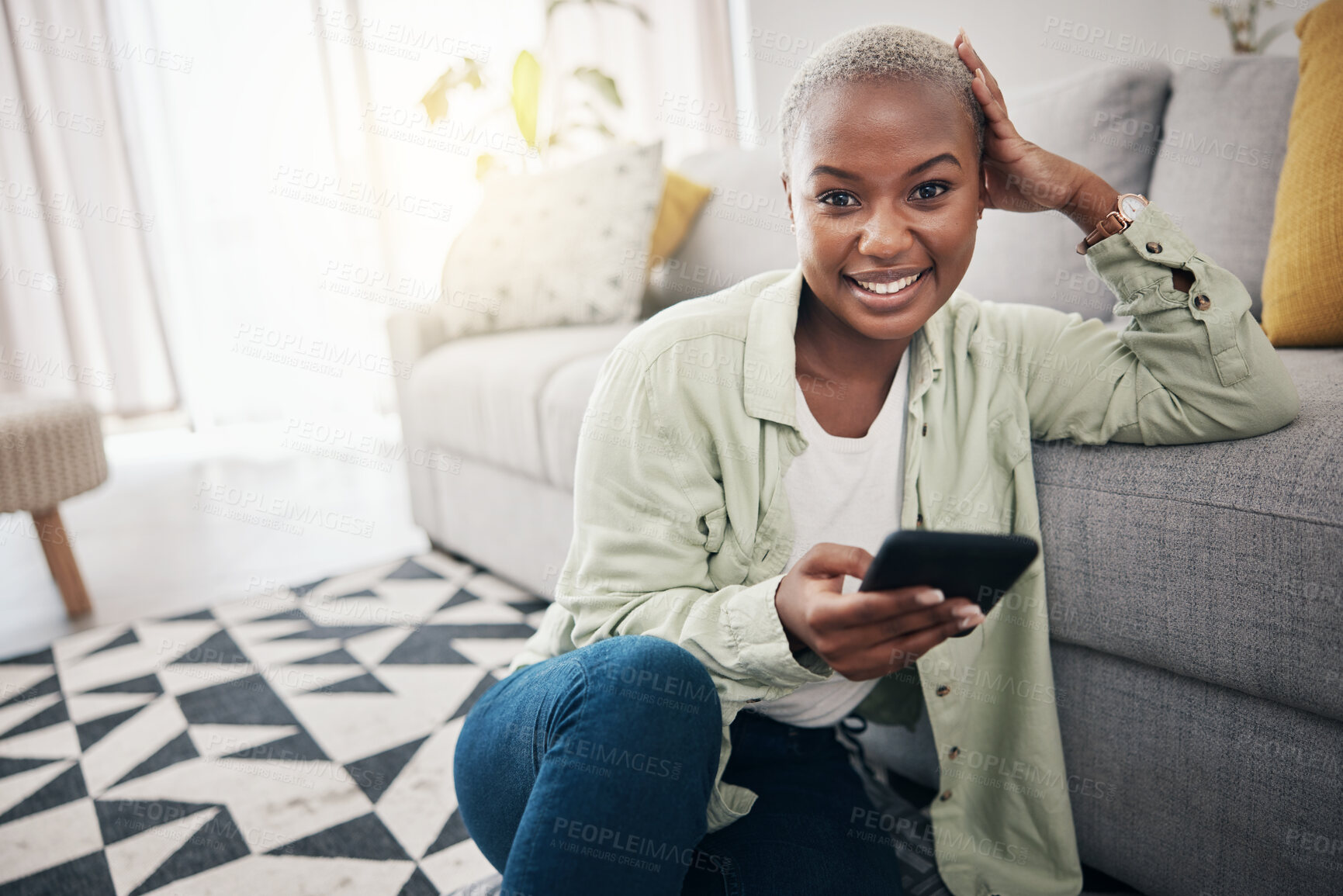 Buy stock photo Happy woman, portrait and phone on floor in lounge for social media post, search tech contact and subscription to mobile games. African person, smartphone user and download digital multimedia at home