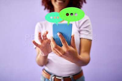 Buy stock photo Phone, hands and woman on social media speech bubble in studio isolated on purple background mockup space. Smartphone, communication and person on chat, feedback opinion or voice notification online