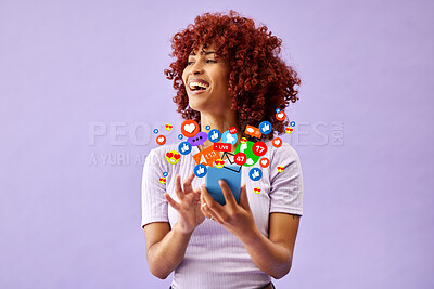 Buy stock photo Phone, social media and emoji reaction with a black woman in studio on a purple background for communication. Mobile, app and notification with a happy young person using technology to like a post