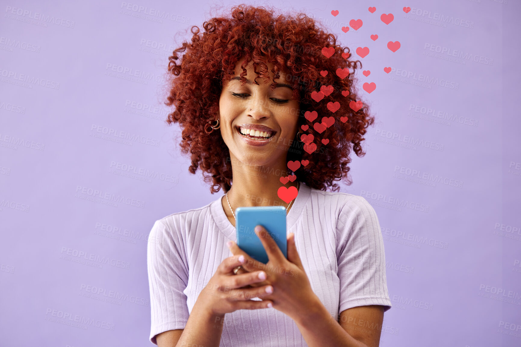 Buy stock photo Happy woman with phone, social media and like emoji in studio to love, subscribe and review on post. Smile, face and influencer on purple background with notification icon opinion on cellphone app.