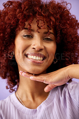 Buy stock photo Happy, selfie and hand on face of black woman with confidence in profile picture for social media, blog or post. African, portrait or happiness with natural beauty or cosmetics on purple background
