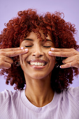 Buy stock photo Happy, hair and woman hands on face in studio for natural, cosmetic or wellness on purple background. Haircare, beauty and lady model smile for red afro growth, texture or dye satisfaction results