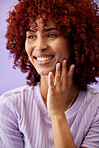 Beauty, wellness and young woman in a studio with natural, health and glamour face routine. Self care, makeup and female model from Mexico with facial cosmetics treatment by a purple background.