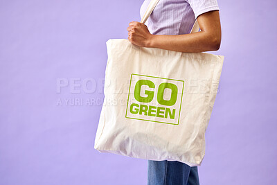Buy stock photo Sustainable, shopping and eco friendly bag by person or recycling customer isolated in a studio purple background. Environment, retail and woman with carbon footprint, zero waste and grocery
