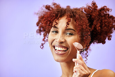 Buy stock photo Beauty studio, portrait and happy woman with roller for facial massage tools, skincare treatment or anti aging routine. Jade quartz stone, cosmetics face product and model smile on purple background