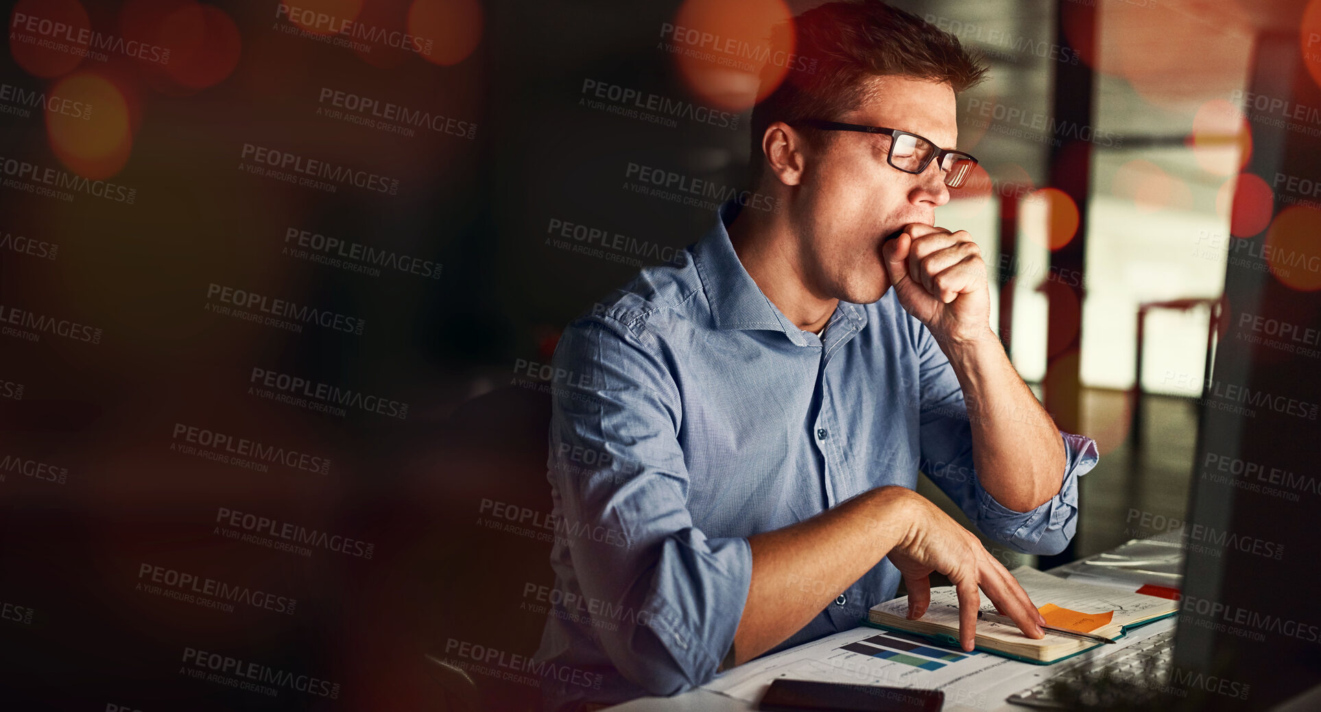 Buy stock photo Business man, yawn and tired in night, desk or bokeh with burnout, stress and deadline in modern office. Accountant, audit and fatigue with documents, notebook or chart for analysis in dark workplace