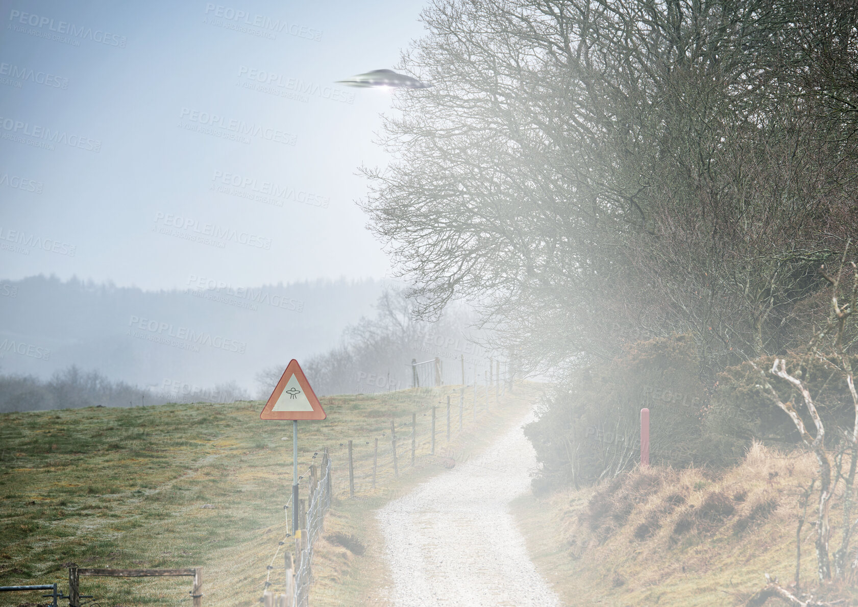 Buy stock photo UFO sign, spaceship and mist road in nature for alien warning, science fiction and abduction. Area 51, travel and signage for extraterrestrial caution in countryside, meadow and natural landscape 