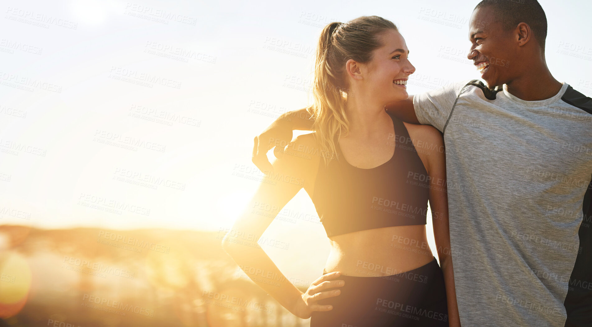 Buy stock photo Couple, fitness and banner with sun, hug and happiness outdoor, mockup space and wellness. Love, care and trust, interracial exercise friends and lens flare, smile with workout together and healthy