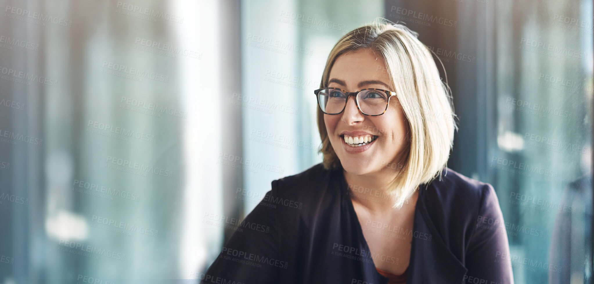 Buy stock photo Face, smile and mockup with a designer woman in a creative, professional or modern workplace. Vision, thinking and space with a happy young design employee in her office boardroom for planning