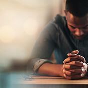Black man, hands and praying with worship and banner, God and religion ...
