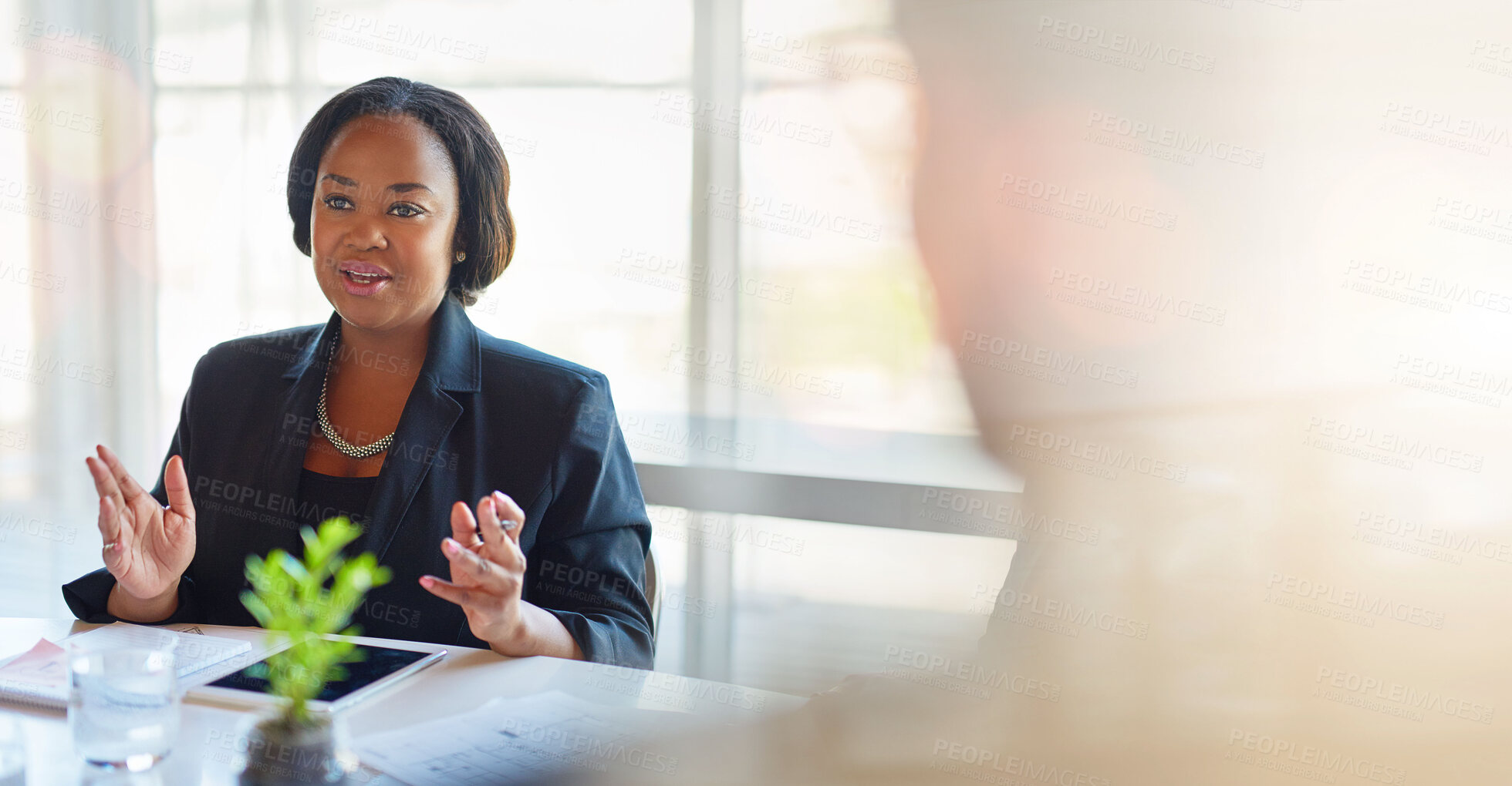 Buy stock photo Conversation, meeting and businesswoman in office with mockup space banner for advertising. Discussion, career and professional young female designer talking in workplace with mock up for marketing.