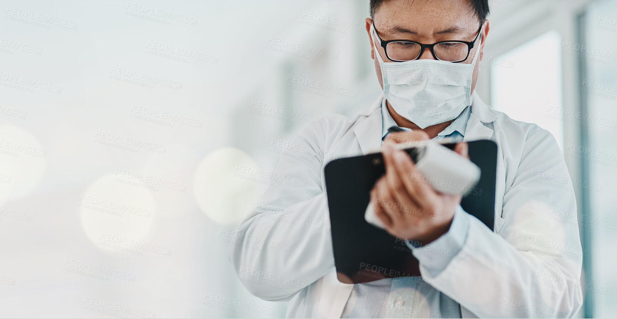 Buy stock photo Covid, doctor and tablet in hospital for online consulting, corona virus and medical analysis with mask. Healthcare, person and professional with digital tech for research and planning at work