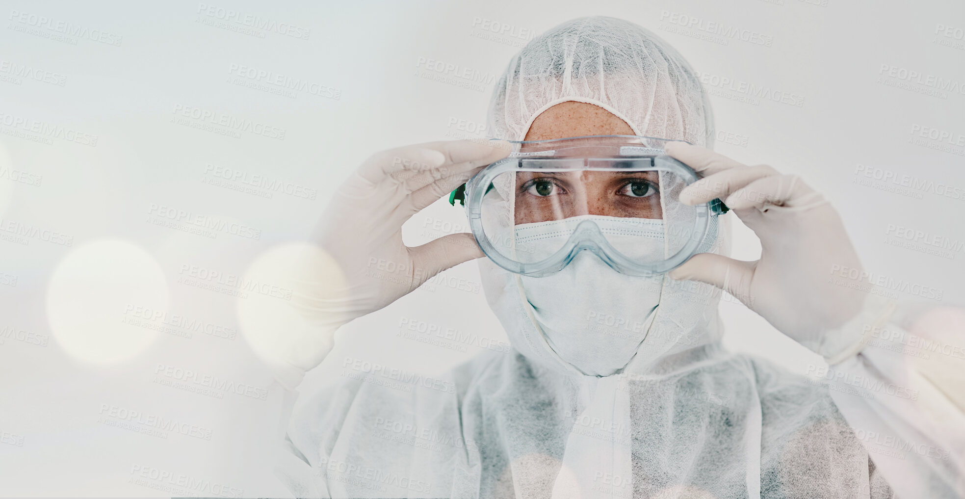 Buy stock photo PPE, person and safety suit goggles of lab worker and healthcare professional in hospital or clinic. Cleaning, bacteria protection and face mask with virus, pharmacy and wellness research with bokeh