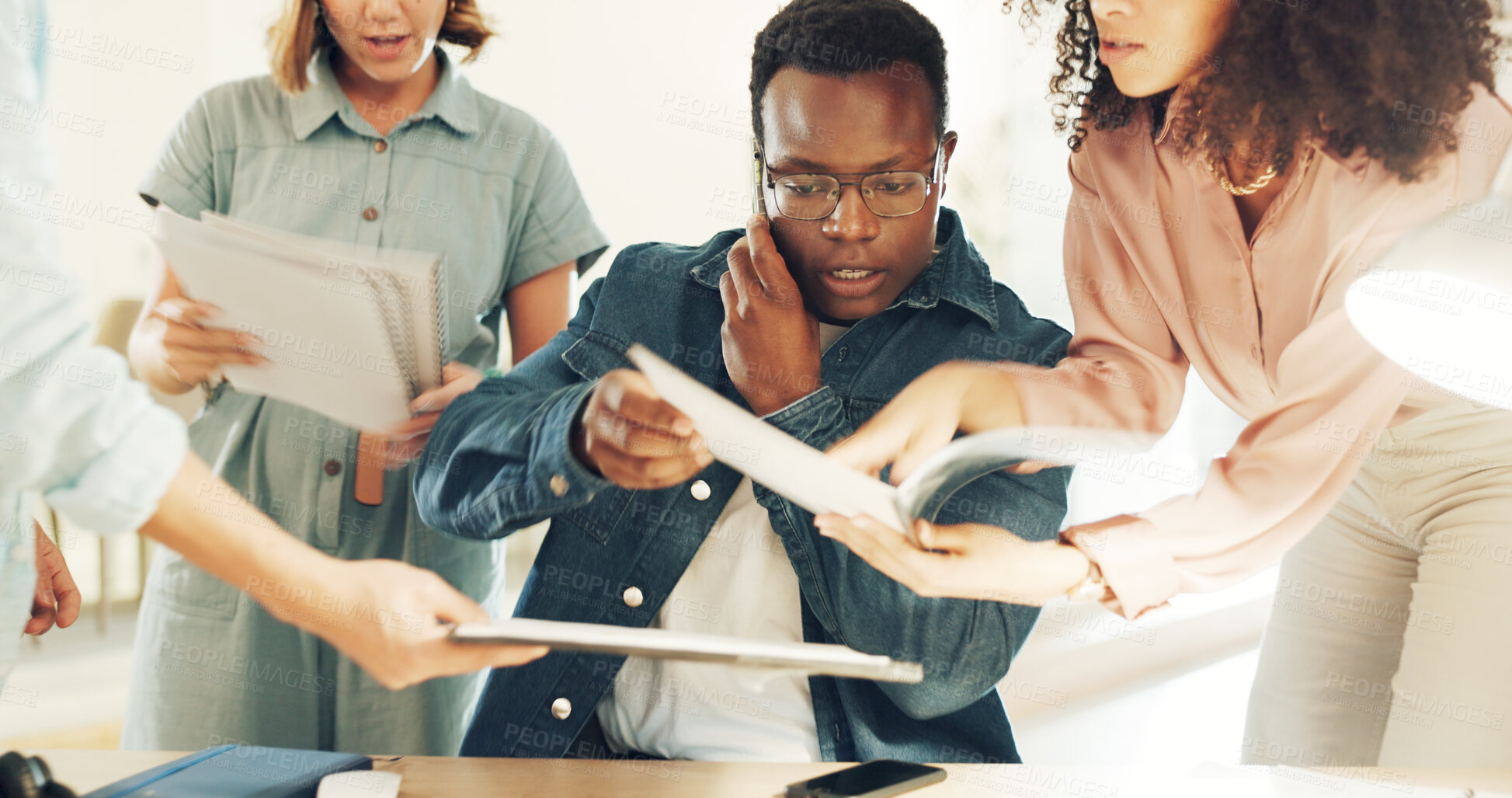 Buy stock photo Business man, overwhelmed and hands with phone call, documents and support staff in busy office. Leader, manager or tired boss with notebook, paperwork and burnout with employee group with questions