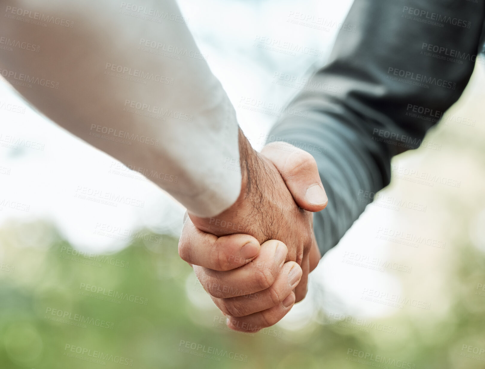 Buy stock photo Closeup, people and shaking hands outdoor for meeting, introduction or hello in support, success or team. Handshake, thank you or collaboration of friends in community for solidarity, respect or deal