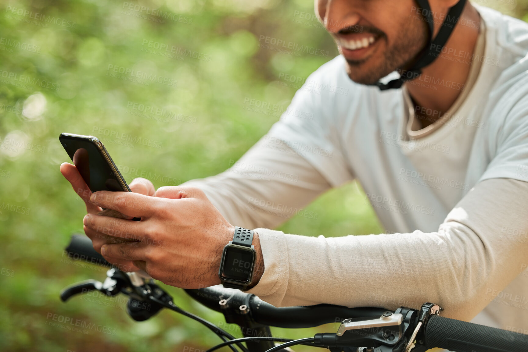 Buy stock photo Man, forest and phone on bicycle, texting or smile for web chat notification for adventure on location. Guy, cycling and smartphone for search location with bike, relax or social network app in woods