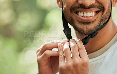 Buy stock photo Hands, helmet and ready for cycling in forest for man, smile and buckle for training, adventure or transport. Guy, closeup and happy with ppe, countryside and preparation in woods, park or nature