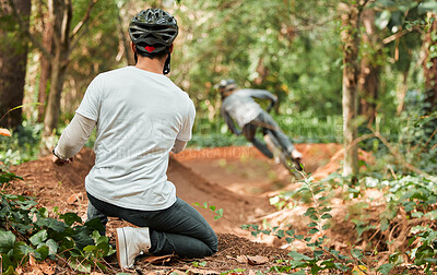 Buy stock photo Man, bicycle and forest with photographer, speed and off road for race, cycling video or post on web blog. Guy, bike and recording for vlog, live stream or social network in woods for outdoor sports